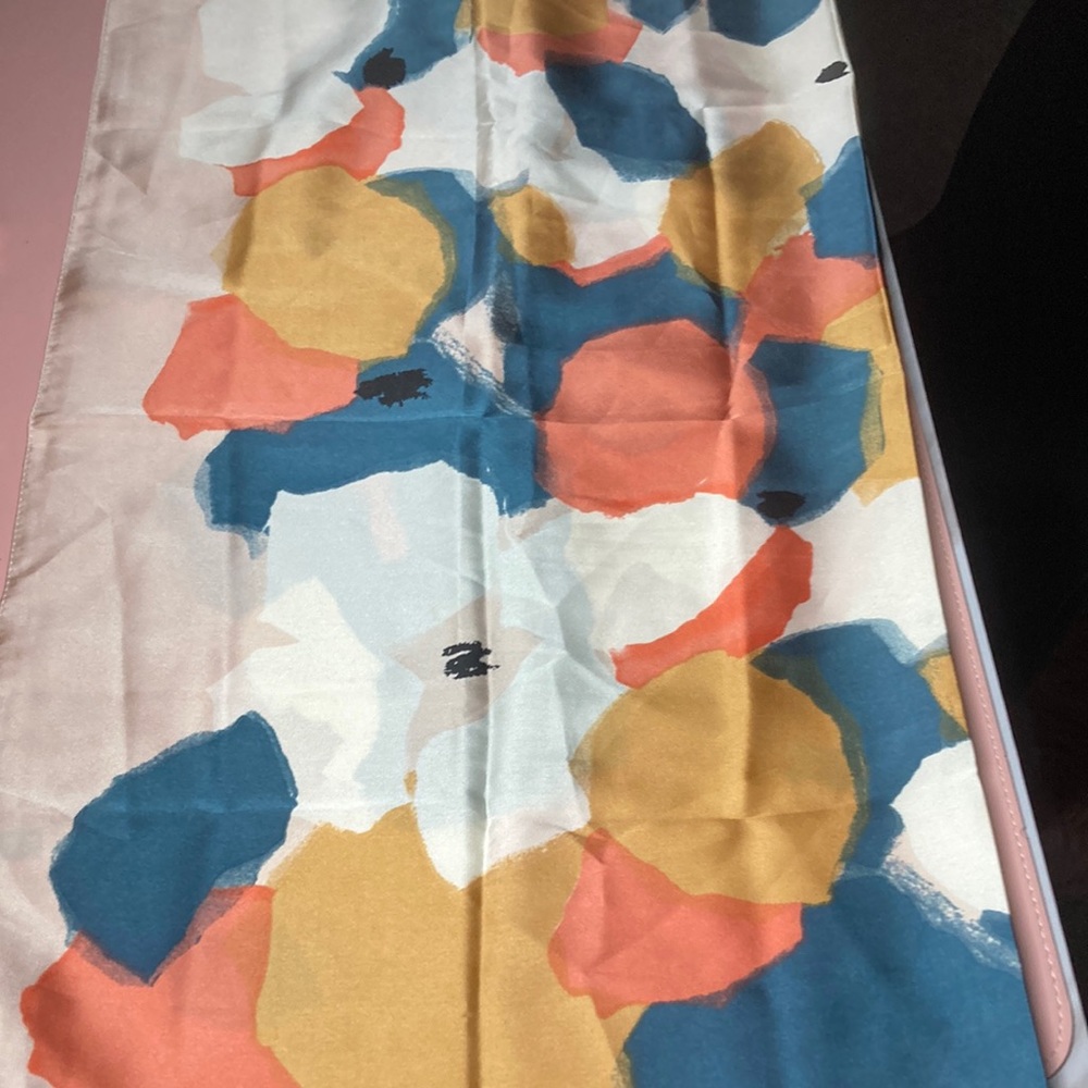 NWOT silky square scarf- abstract design with multi colors on a pink background